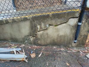 The damage to the disabled ramp is noncompliance and had to be demolished and replaced.